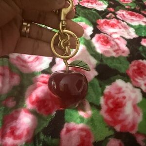 Coach Burgundy Apple Keychain with Gold Hardware